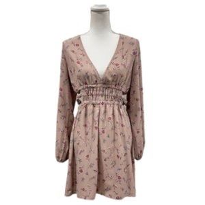 Ditsy cut-out dress. Size small. New with tags. Color: mauve